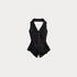Black vest on a light gray background
